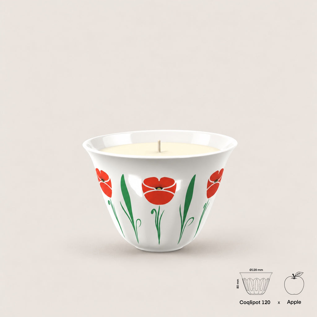 Coqlipot® 120 Poppy Candle Edition, Red — cement vessel with red poppy and green leaf decals, single-wick soy-blend wax candle, shown with apple for scale